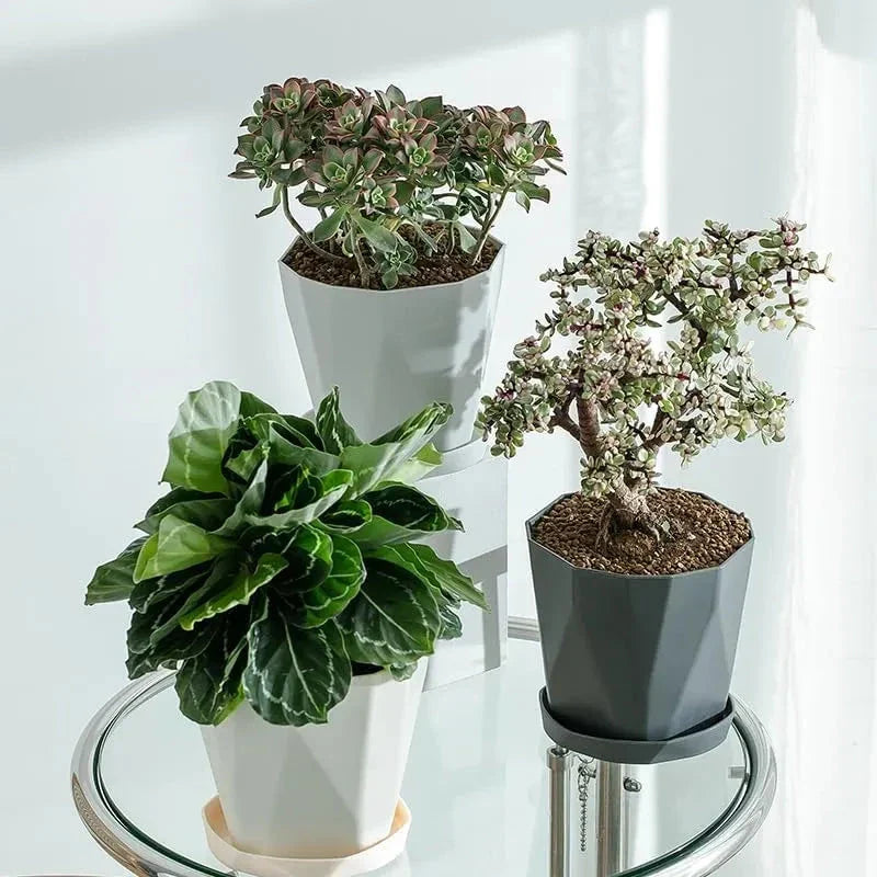 Nordic-style resin flower pot in grey, featuring a minimalist design and suitable for indoor use in UK homes and offices