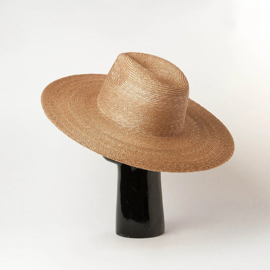 Premium outdoor sun protection straw hat in black, brown, and pinkish colours with a large brim and tie-dye pattern