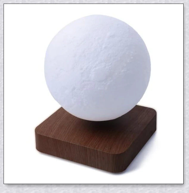 Lunamen Magnetic Levitating Moon Lamp with detailed lunar surface and floating above magnetic base