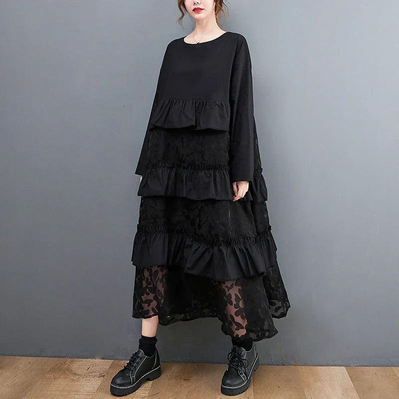 Stylish plus size dress in sophisticated black mesh fabric with wide waistline and long sleeves