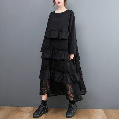 Stylish plus size dress in sophisticated black mesh fabric with wide waistline and long sleeves
