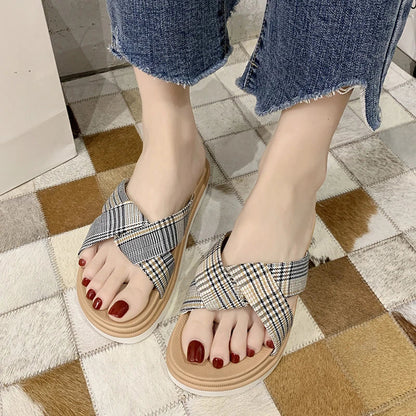 Premium non-slip herringbone slippers with a bow accent, featuring a canvas upper, fetal cowhide lining, and a rubber sole for comfort and stability.