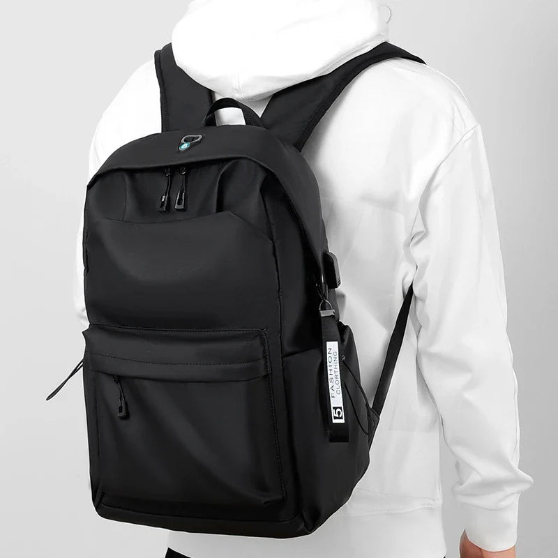 Premium casual laptop rucksack with adjustable, padded shoulder straps and dedicated laptop compartment for men's travel