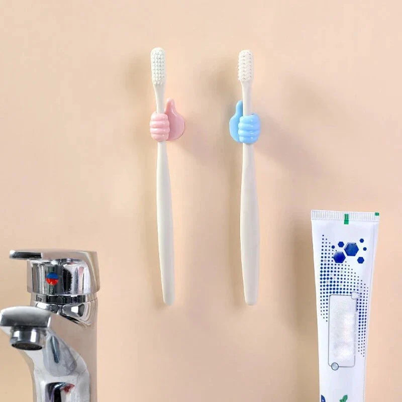 Hand-shaped silicone hooks in blue colour, used to organise desks, bathrooms, and cars