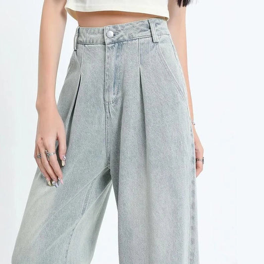 Premium high-waisted vintage straight leg women's jeans in a light wash finish with decorative details