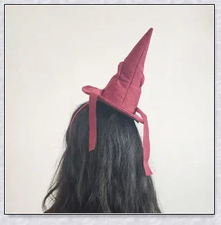 Sortband Halloween Witch Hat Headband in red, green, and brown colours with a detachable witch hat design