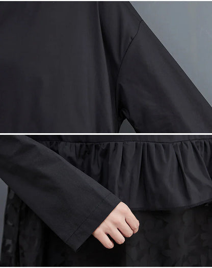 Stylish plus size dress in sophisticated black mesh fabric with wide waistline and long sleeves