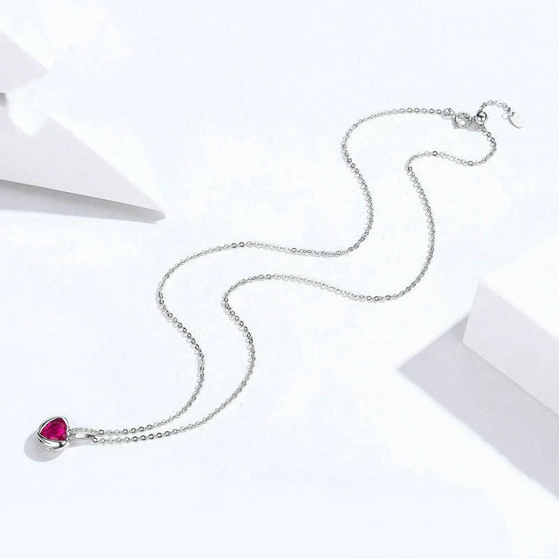 Elegant sterling silver necklace with a timeless design, perfect for adding a touch of British sophistication to any outfit.