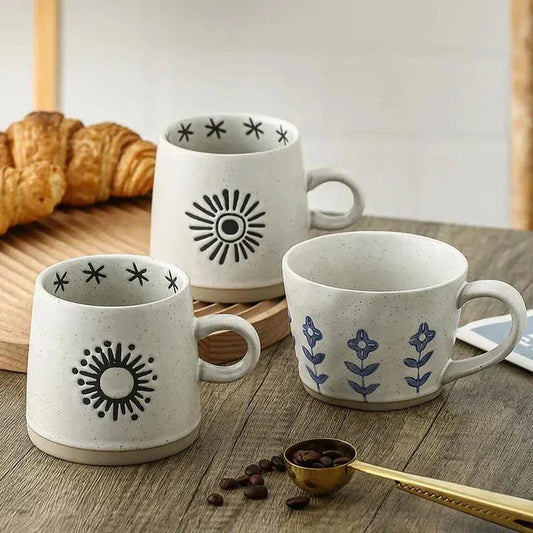 Elegant hand-painted Japanese-inspired ceramic coffee mug with intricate floral design