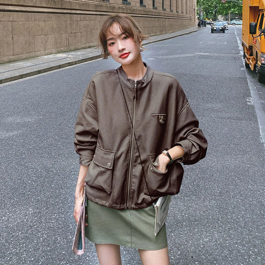 Stylish retro British autumn coat made with premium imitation leather, featuring a stand-up collar and zip-up front closure for a classic and durable look.