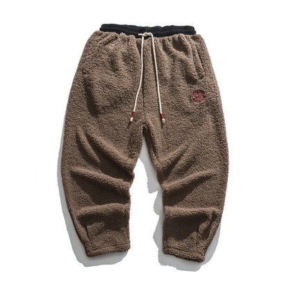 Men's Retro Style Loose Casual Trousers in a variety of colours, including milky white, brown, and black