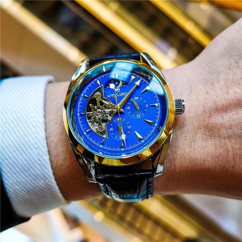 Elegant men's automatic mechanical watch with exquisite hollowed-out design, featuring luminous hands, moon phase display, and small seconds subdial.