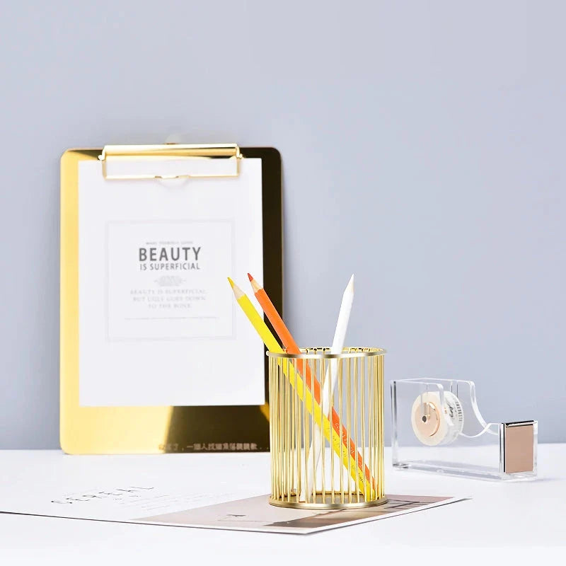 Rose gold plated pen holder with hollow storage tube for organising pens, makeup brushes, and more on desks or vanities