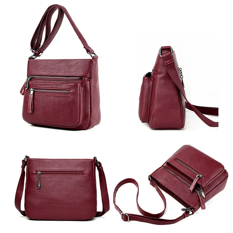 A stylish leather shoulder bag in a modern, box-style design, perfect for busy modern mums.
