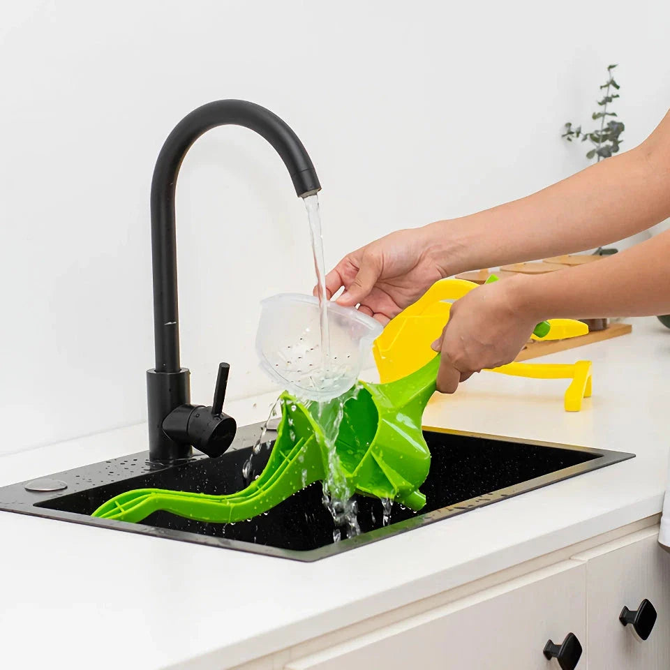 Premium manual fruit and citrus juicer with compact, portable design and multiple colour options
