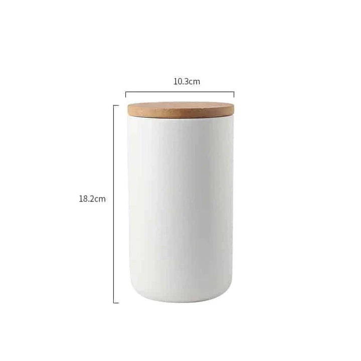 Elegant ceramic storage jars with airtight lids, available in small, medium, and large sizes for versatile kitchen organisation.