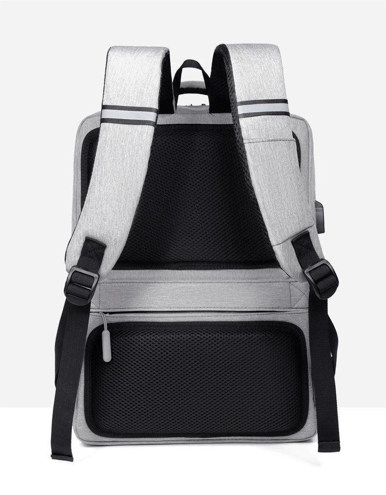 Premium laptop backpack in light grey colour, featuring a sleek and durable polyester design with multiple compartments for organised storage.