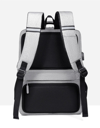Premium laptop backpack in light grey colour, featuring a sleek and durable polyester design with multiple compartments for organised storage.
