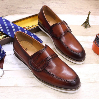 Premium handcrafted British leather casual loafers for men, featuring a round toe, flat heel, and durable rubber sole
