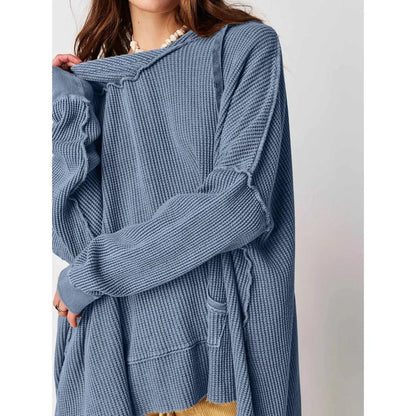Cosy and stylish oversized hoodie with practical pockets for women, available in black, charcoal grey, and navy blue