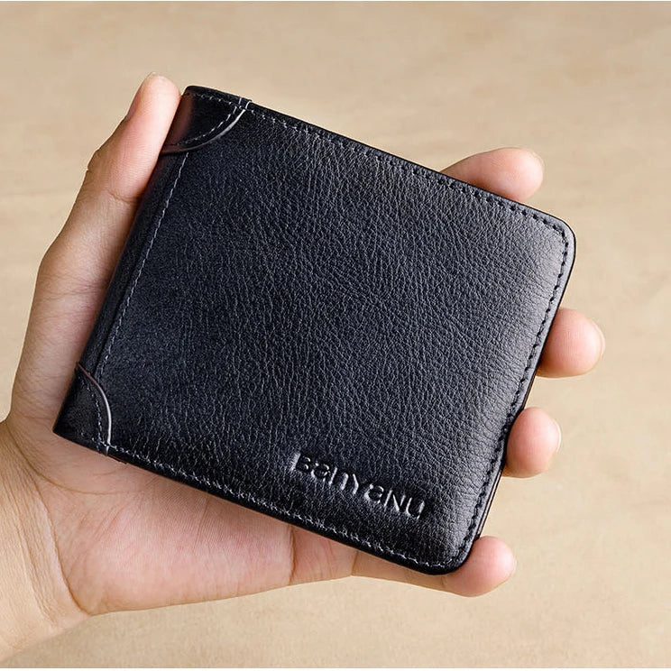 Premium men's short leather wallet with tri-fold design, made from top-grain cowhide leather for exceptional quality and style.
