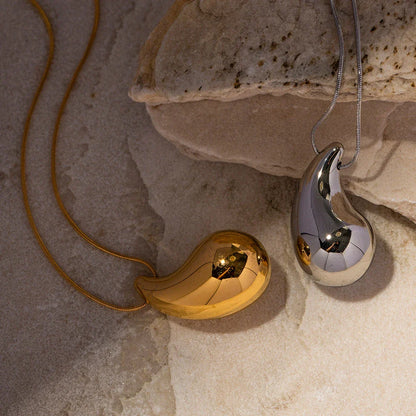 Elegant gold-plated stainless steel necklace with a large, sparkling waterdrop-shaped pendant