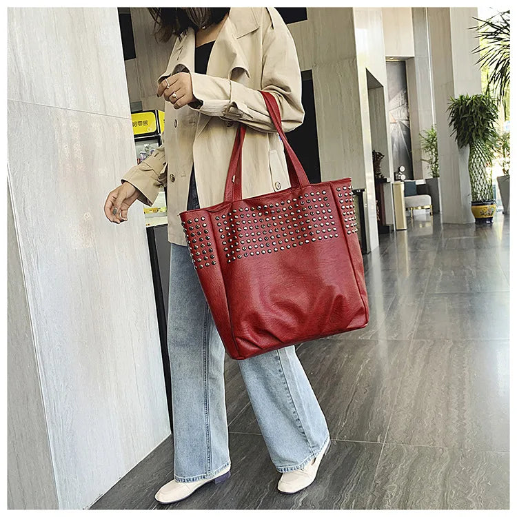 Premium British leather tote bag in black, featuring a large capacity design and stylish, versatile appeal.