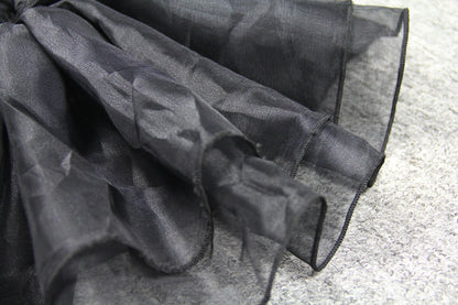 Elegant puff sleeve mesh dress with a flattering short, irregular skirt in white and black colours