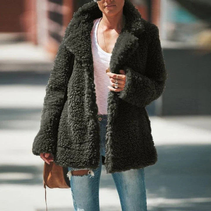 Stylish long-sleeve jacket cardigan in black, made with premium polyester for comfort and durability