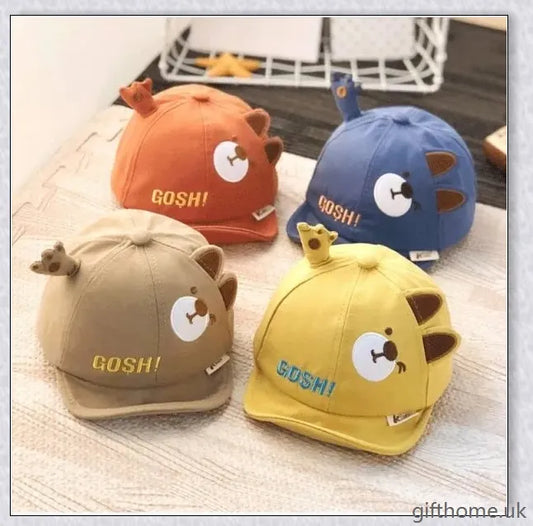 Adorable cartoon baby cap in various colours, made of breathable linen-blend fabric for comfort and sun protection