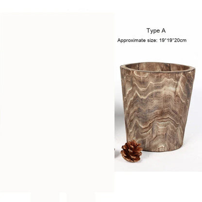 Handmade wooden flower pot and vase in a modern, minimalist design made from sustainable willow wood