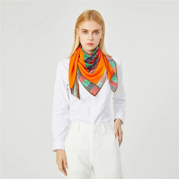 Elegant silk square scarf with vibrant floral print and handmade curled edges