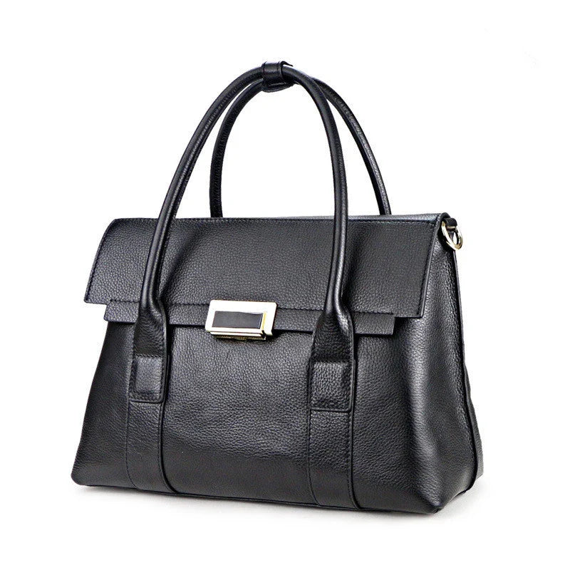 Premium first-layer cowhide leather shoulder bag with adjustable strap, spacious interior, and classic fashion design