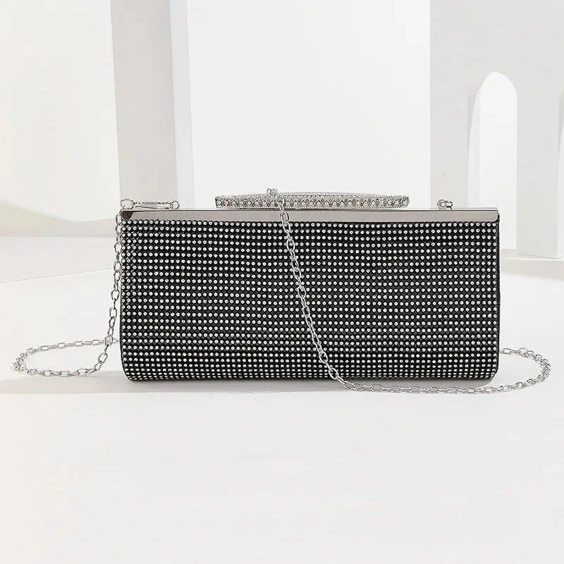Glamorous gold rhinestone evening clutch with elegant chain and diamond decorations, perfect for UK special occasions