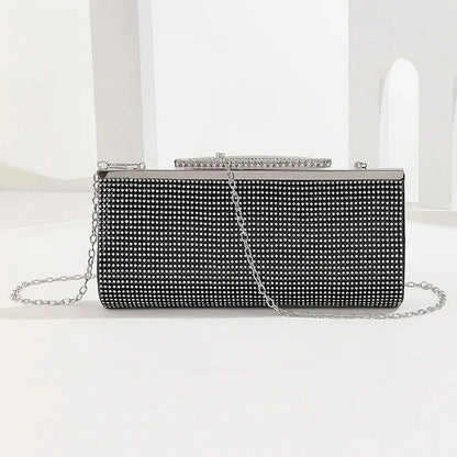 Glamorous gold rhinestone evening clutch with elegant chain and diamond decorations, perfect for UK special occasions