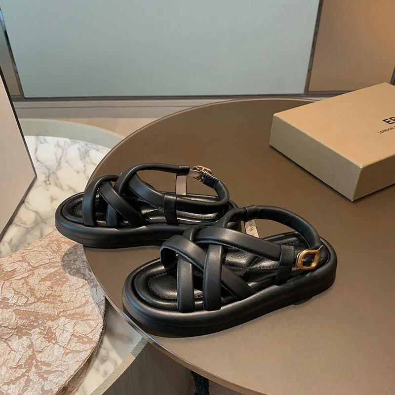 Premium thick-soled sandals in black, beige, and blue colours with a sheepskin upper and rubber sole
