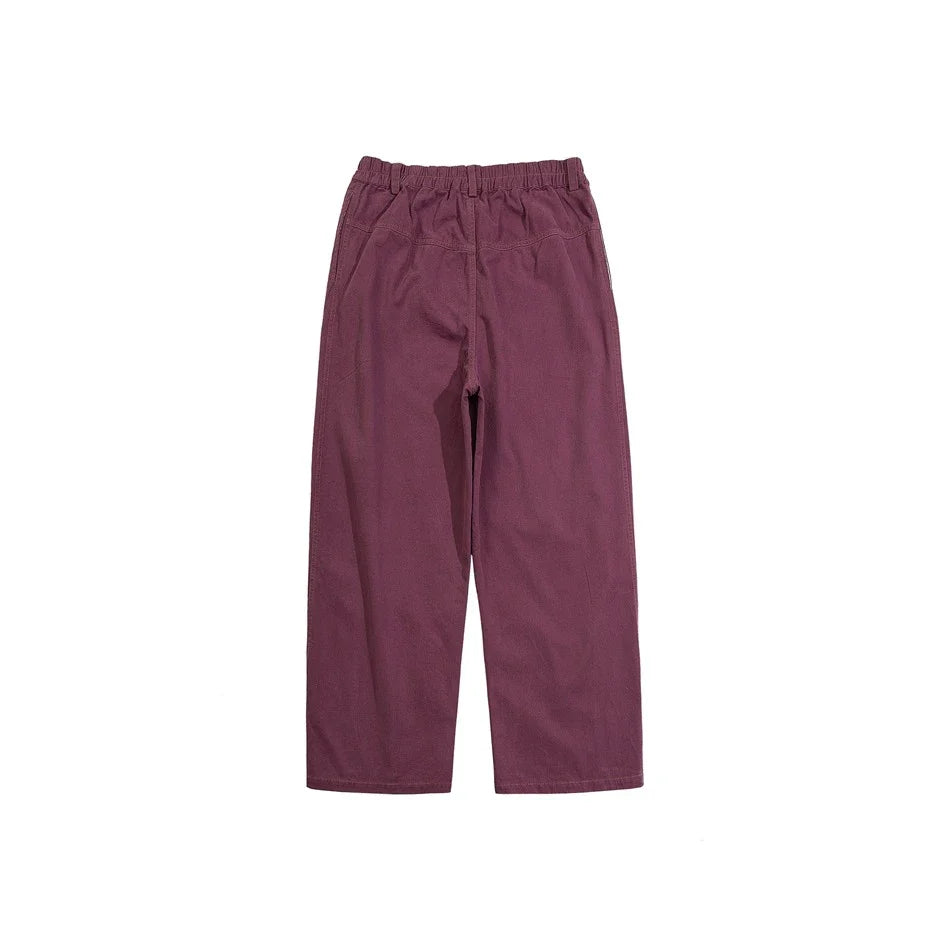 Sophisticated men's casual trousers in various colours, featuring a tailored straight-leg design and mid-rise waistline for a polished, British-inspired look.