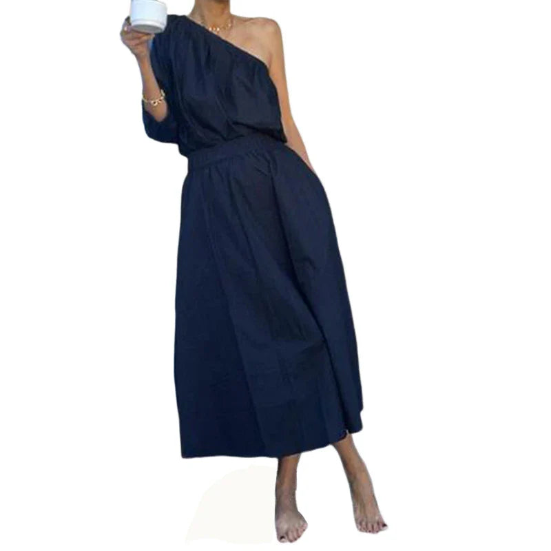 Elegant two-piece mid-length skirt suit with oblique shoulder design, made with premium polyester fabric and boutique four-sided elastic band