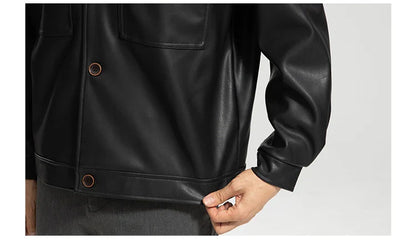 Handsome men's leather motorcycle jacket with lapel collar, dimensional pockets, and durable PU leather construction