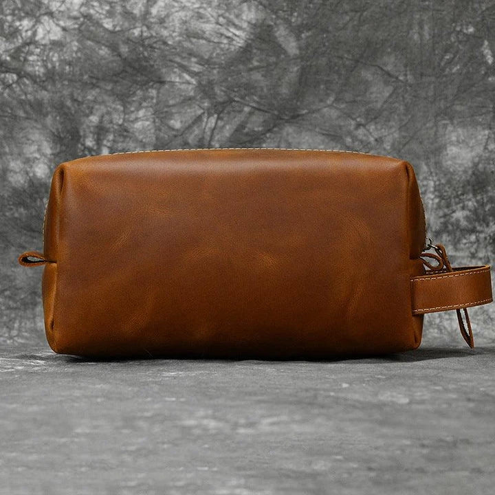 Premium leather clutch bag with multiple interior pockets, designed for the sophisticated British gentleman