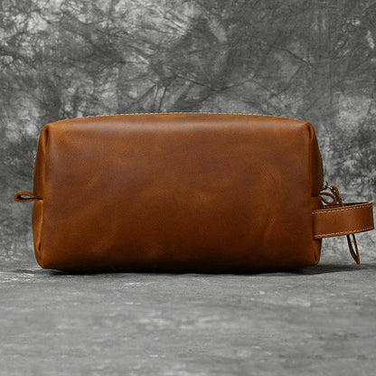 Premium leather clutch bag with multiple interior pockets, designed for the sophisticated British gentleman