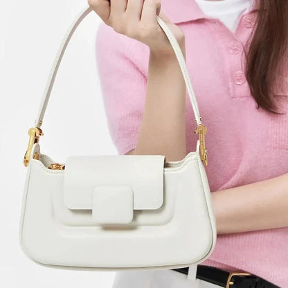 Sophisticated silk-lined TPU crossbody baguette bag in green, black, and navy colours
