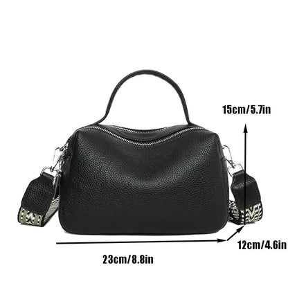 Luxurious genuine leather crossbody bag for women, featuring a soft polyester lining, dual phone pockets, and a compact, square design.