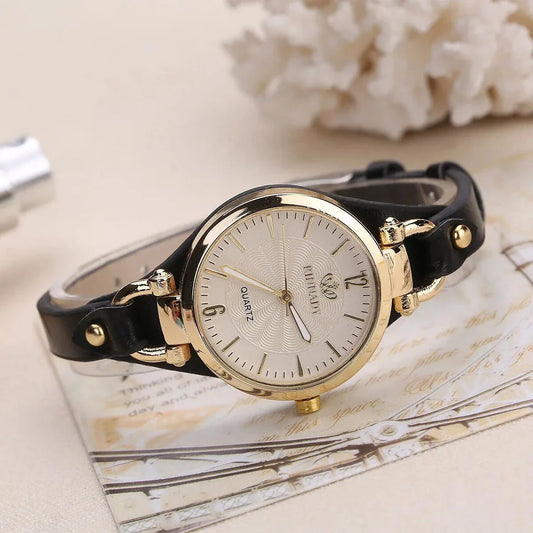 Elegant leather strap quartz watch with a sleek alloy case and durable glass dial for everyday elegance