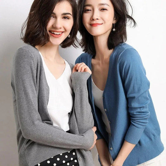 Chic v-neck single breasted cardigan in blue, green, and pink colours with a sophisticated and timeless design