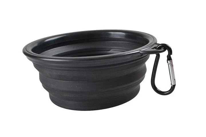 A collapsible pet silicone bowl in black, with a large 350 ml capacity, designed for outdoor adventures with your furry friend.