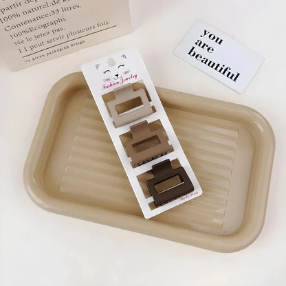 Coffee-coloured geometric hairpin set with frosted finish, various shapes for versatile styling