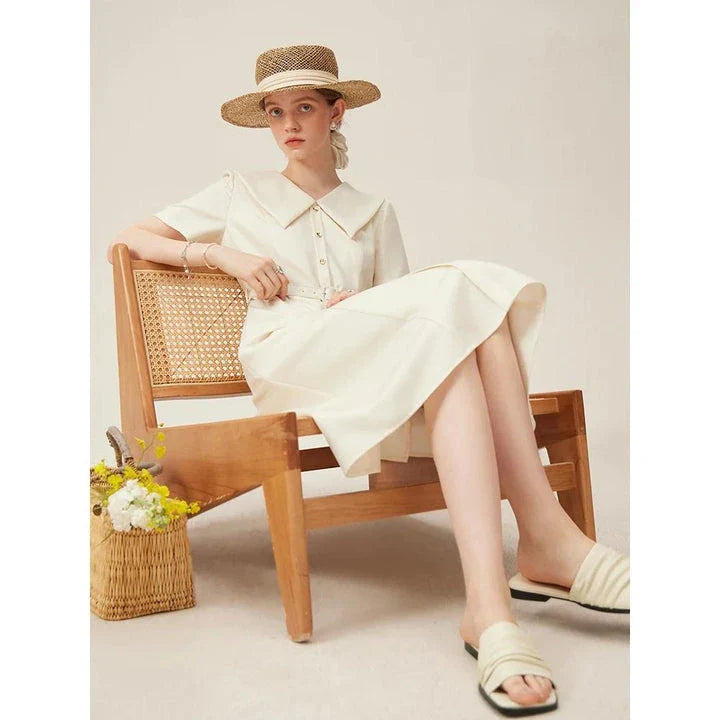 Elegant mid-calf summer dress in a sophisticated style, suitable for professional office wear and special occasions.