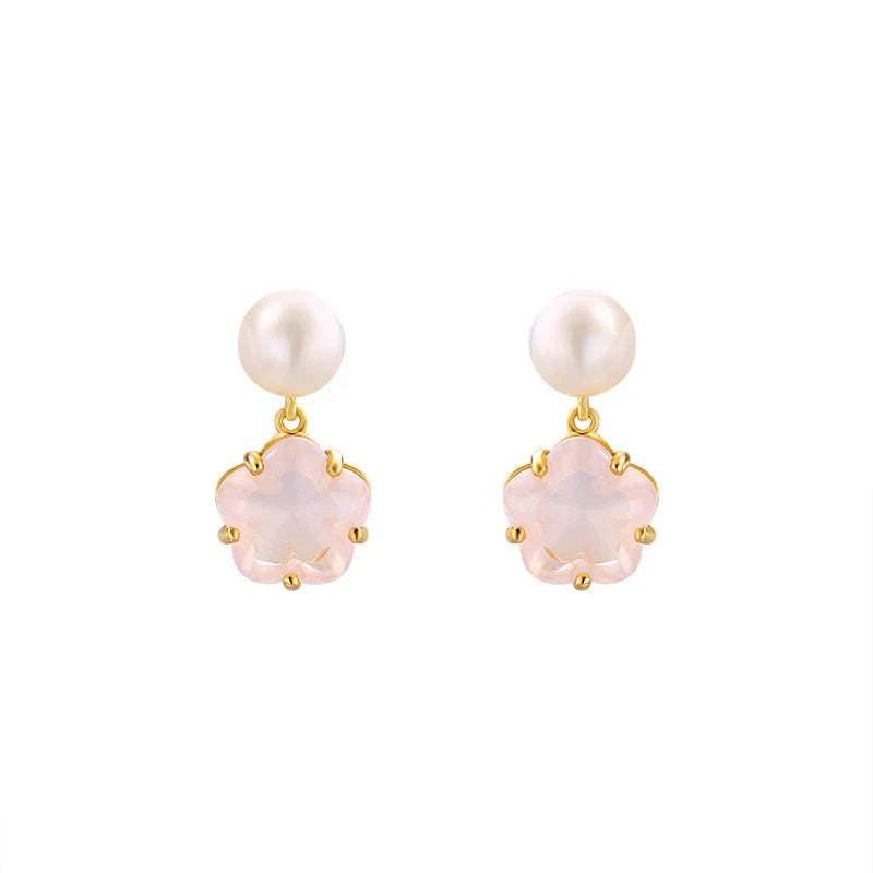 Hypoallergenic silver earrings with delicate cherry blossom crystal accents, perfect for sensitive skin