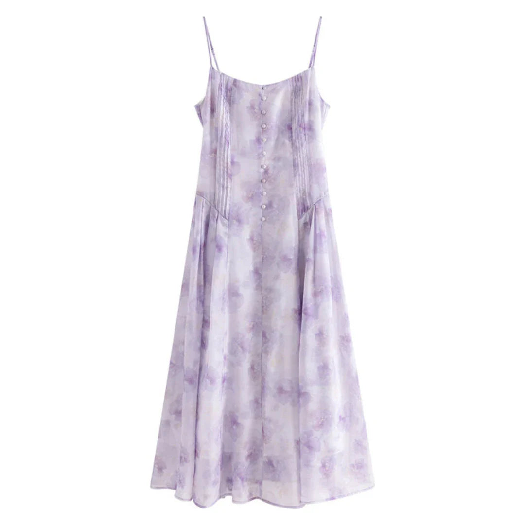 Floral sleeveless summer dress with A-line silhouette and vibrant orange print, perfect for British summer occasions